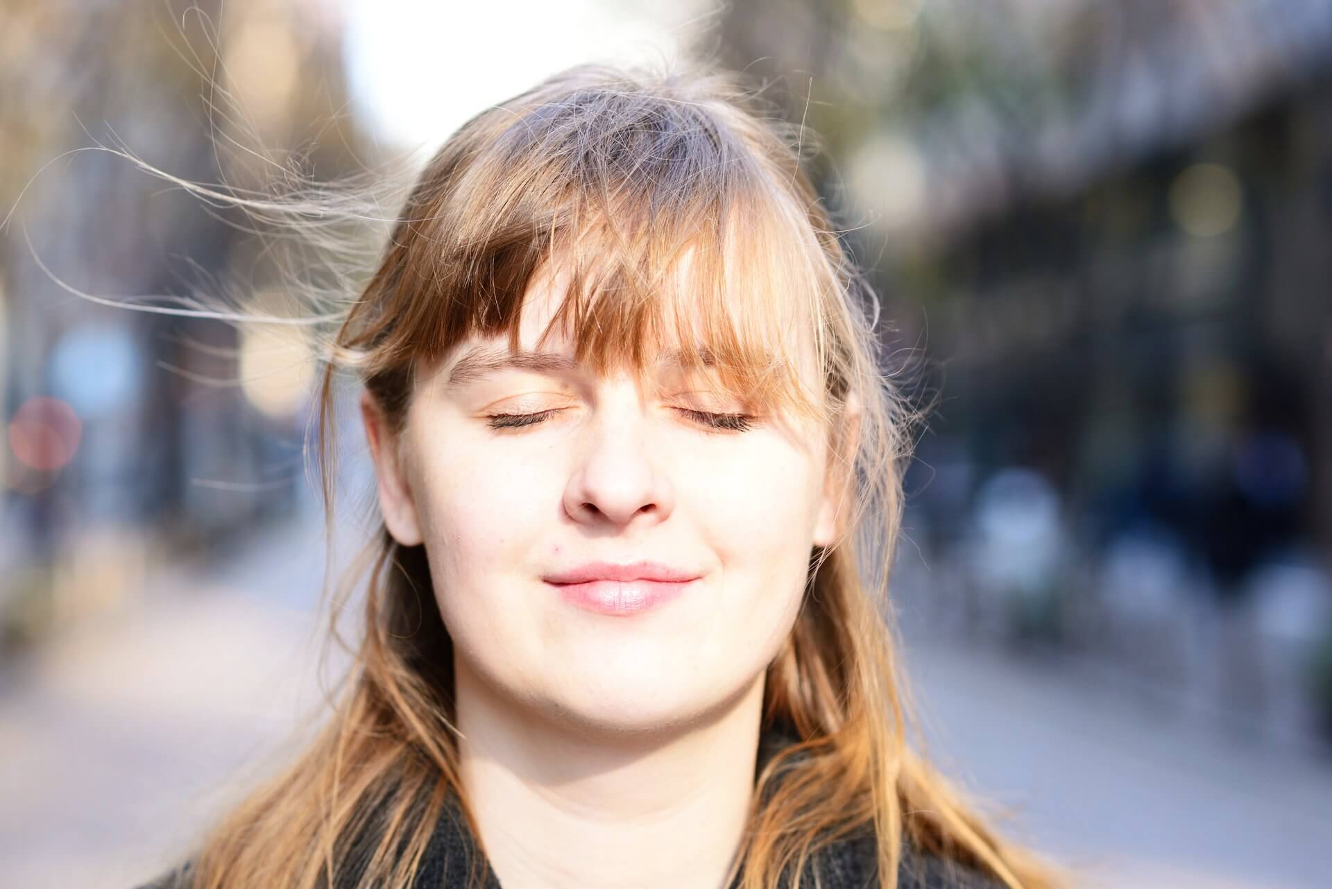 Woman with her eyes closed 