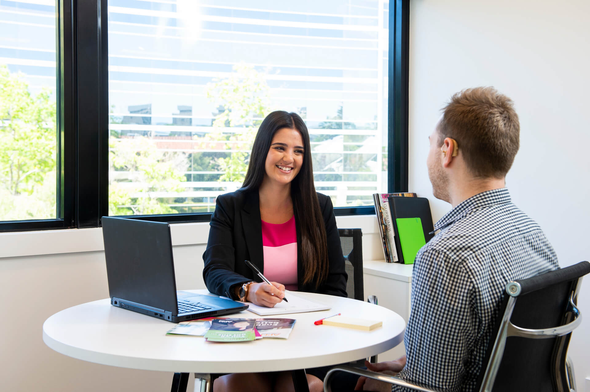 woman questioning a man while both smiling