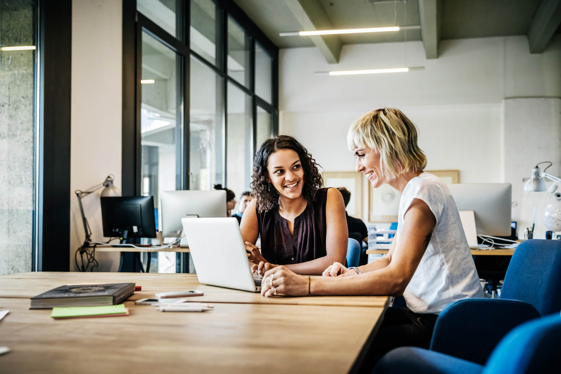 two women discussing