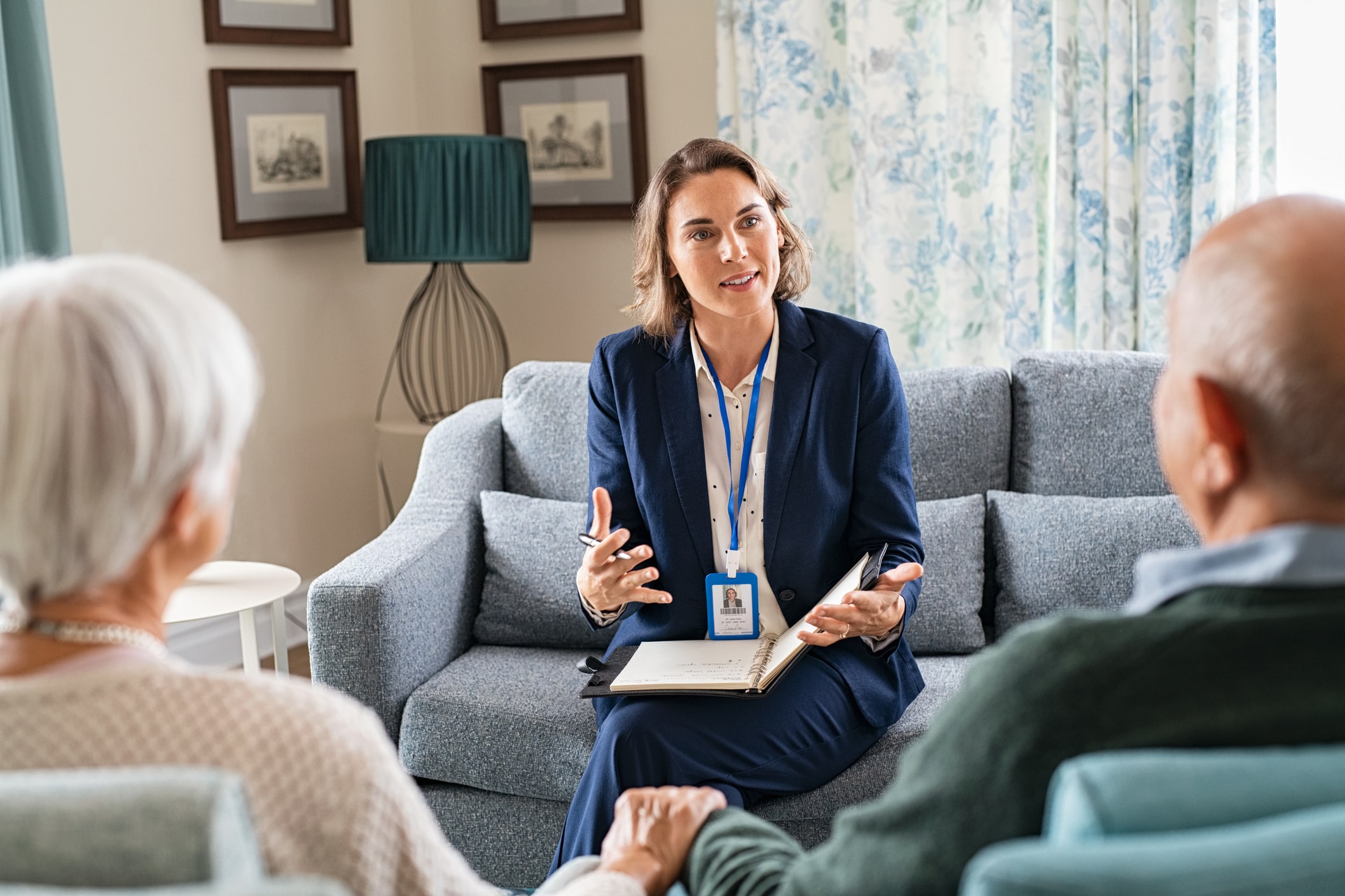 lady talking with two elderly