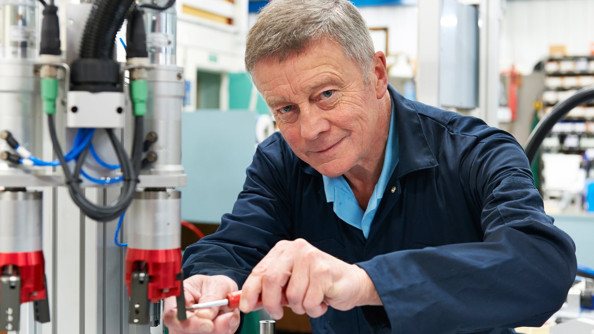 man working with electronics