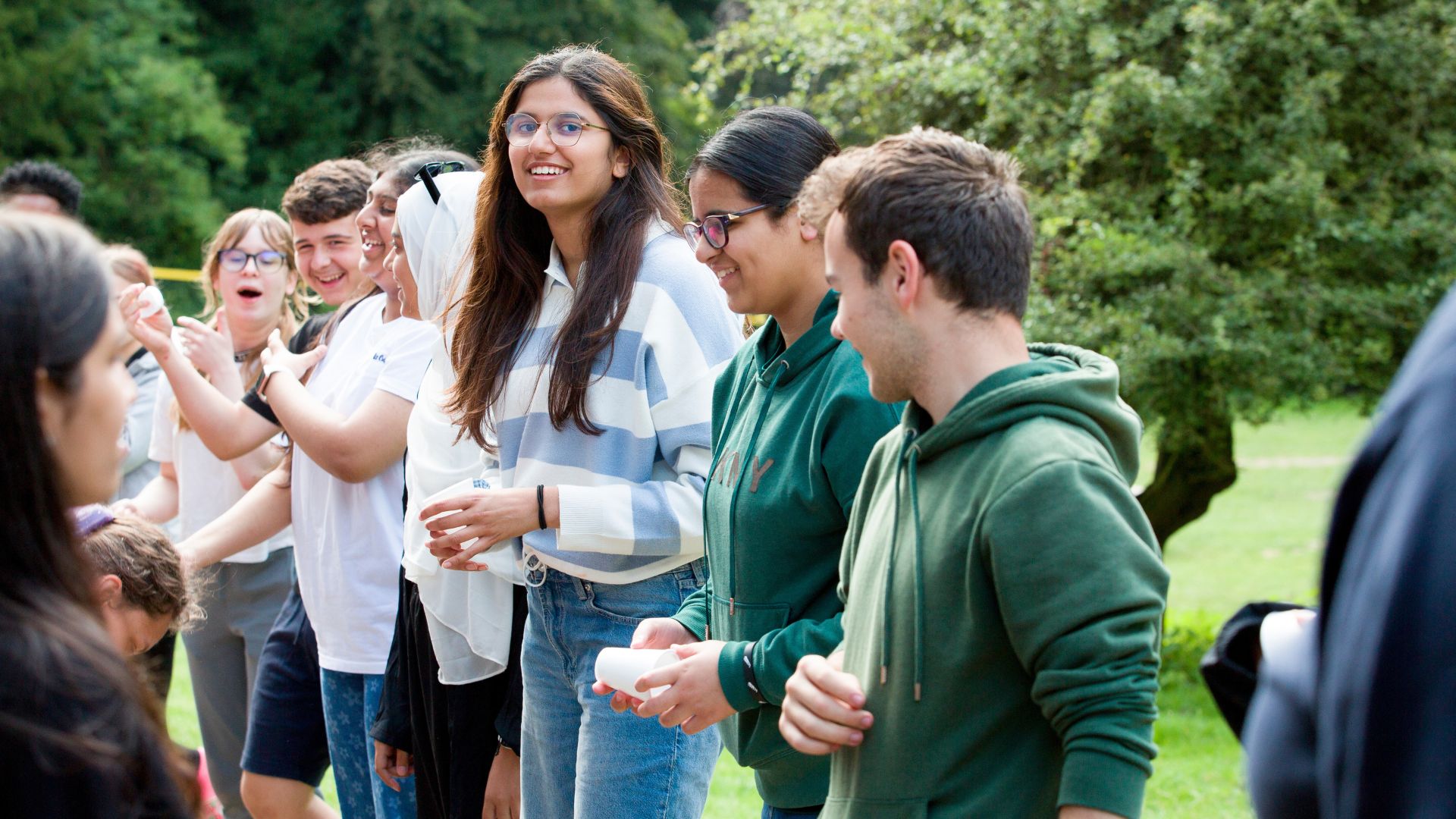 Young people at an event in the UK in a nature reserve