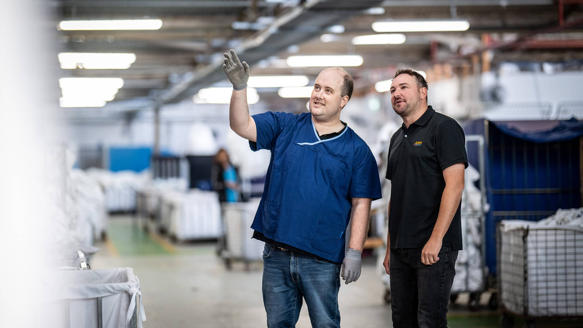 An employee talking to their employment consultant in the workplace