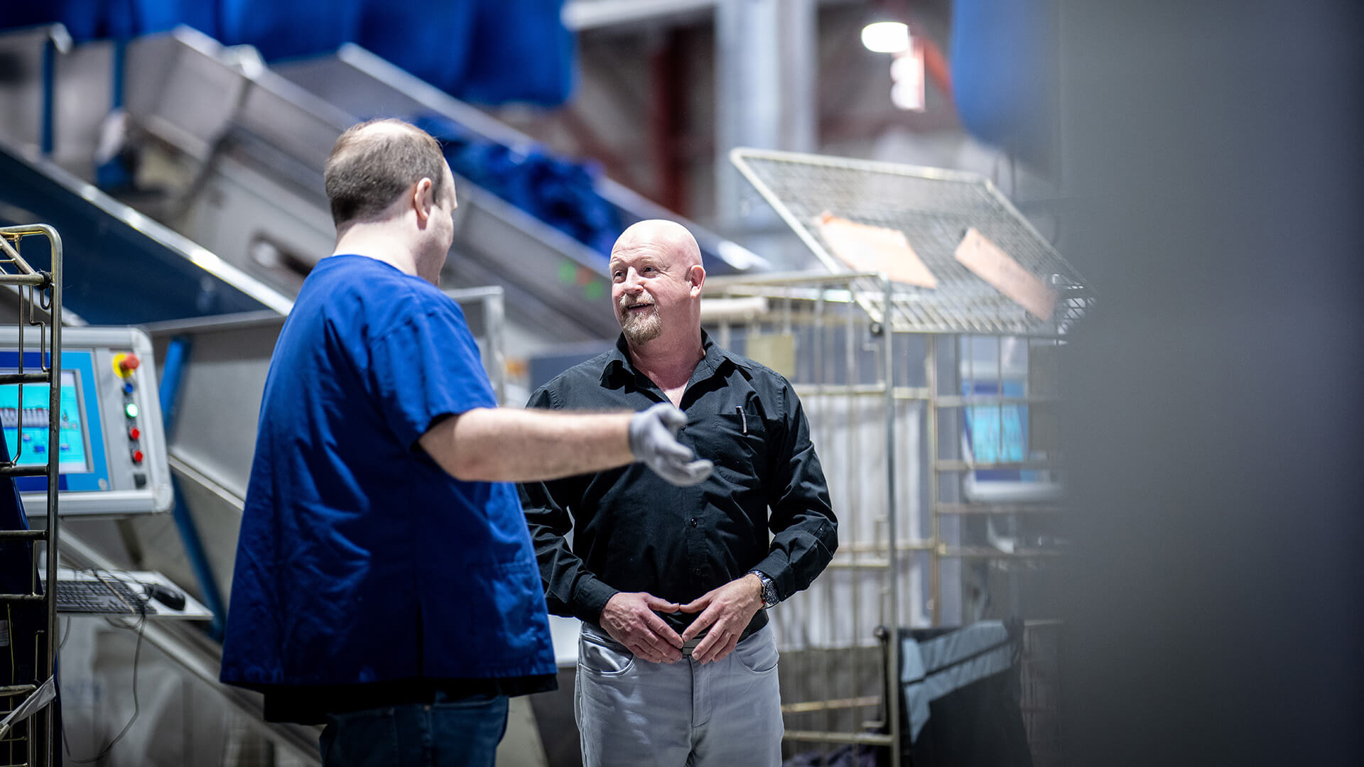 Stephen and his employer in a warehouse