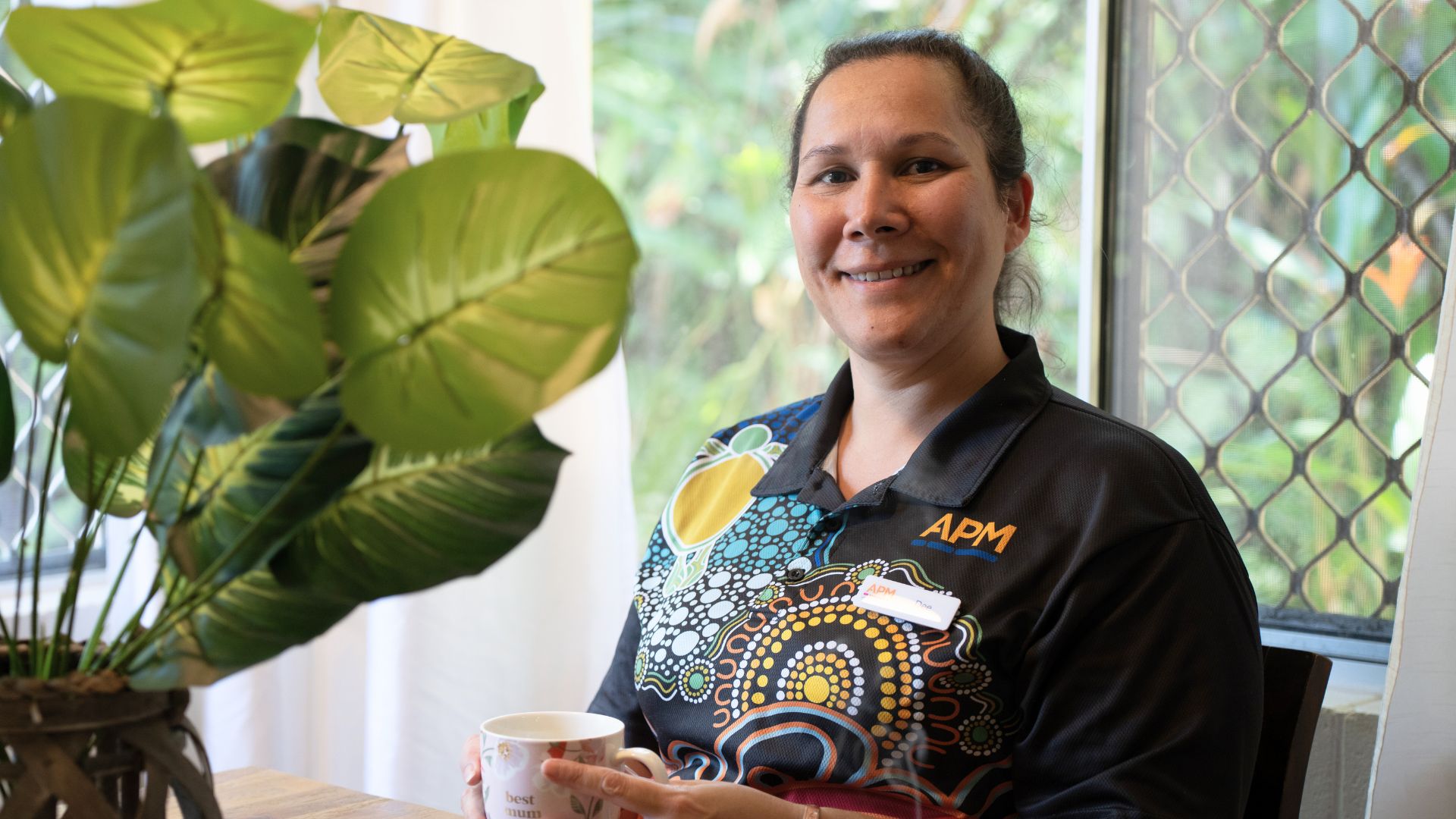 Dee from APM in a First Nations top